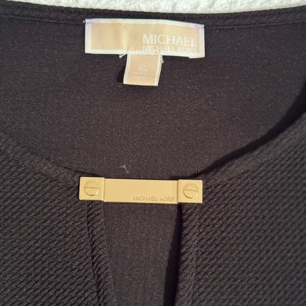 Michael Kors women’s black tunic with elbow cutouts in flattering knit fabric